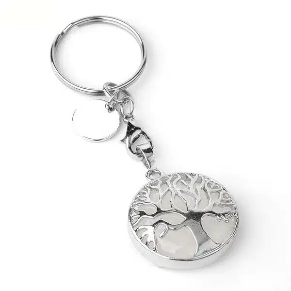 Porte-Clés Arbre de Vie en Pierres Naturelles Cristal de Roche agrémenté d'un arbre de vie argenté vendu par la Boutique Z Comme Zen spécialisée en Lithothérapie