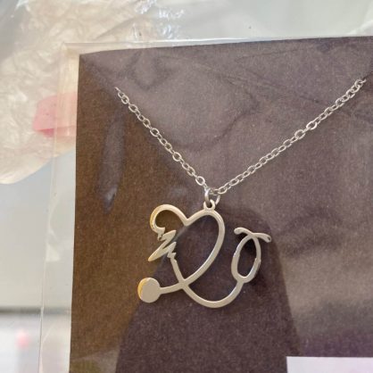Collier Pendentif Acier Coeur et Stéthoscope "Dacca" - Doré photo review